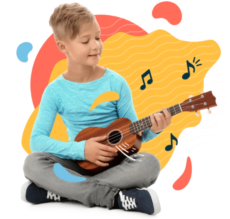 chłopiec gra na ukulele